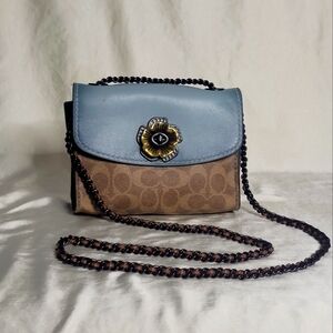 Coach Purse with metal flower details